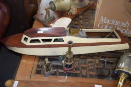 Early 20th Century hardwood model boat, 90 cm long together with a further small methanol engine and