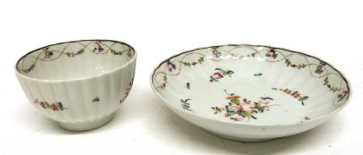 Late 18th Century English porcelain tea bowl and saucer decorated with flowers