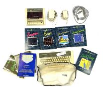 A vintage Acorn computer and accessories to include: - Acorn Electron keyboard - Acorn casette