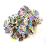 A large quantity of bagged fast-food gift toys, to include Disney, The Simpsons, Action Man,