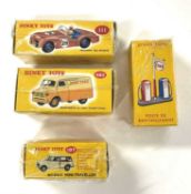 A collection of boxed Dinky Toys to include: - 197 Morris Mini-Traveller - 482 Bedford 10 CWR