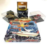 A mixed lot of collectible model vehicles to include: - A 1987 boxed set of Matchbox Virgin vehicles