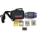 A Gameboy Advance in a Nintendo branded case, with game cartridges to include: - Pokemon Yellow -