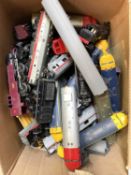 A large box of assorted 00 gauge railway train and carriages. Predominantly Triang, in various