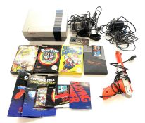 A Nintendo Entertainment System (NES), complete with 4 original gamepads, Nintendo Zapper and