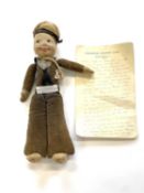 An early 20th century cloth doll, formed as a sailor from the T.S.S Letitia (Donaldson Atlantic