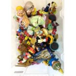 A large quantity of vintage Disney figurines and models, featuring Snow White and the Seven Dwarves,