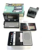 An Atari Portfolio in original box, 'A Full Featured Personal Computer in the palm of your hand',