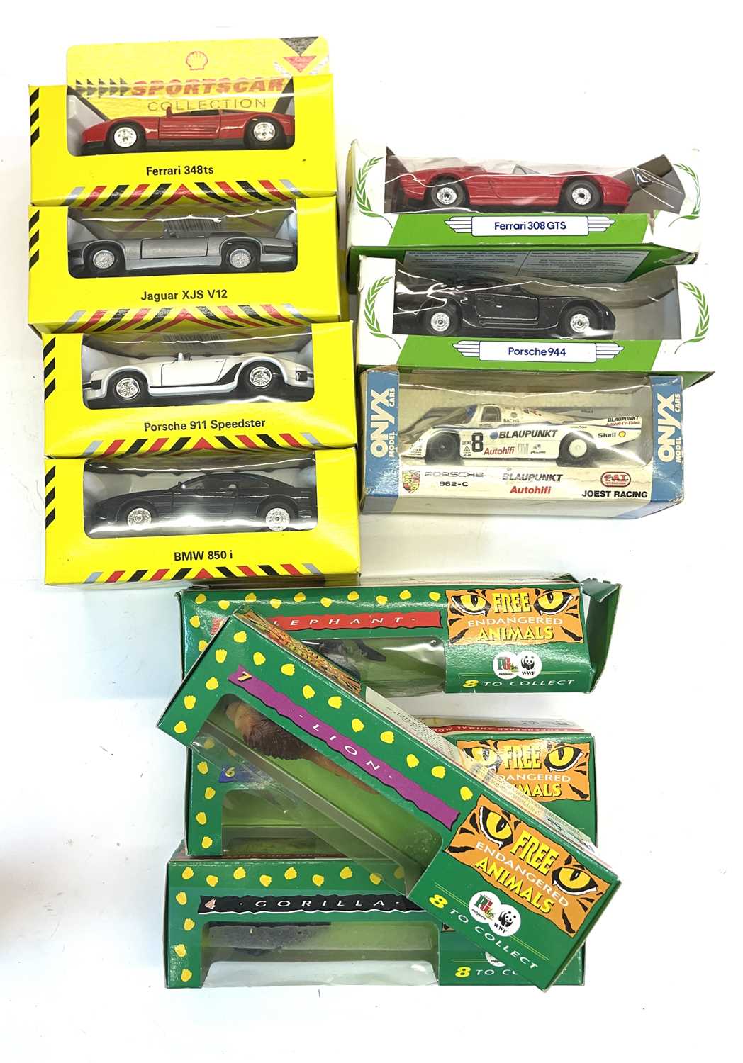 Mixed lot of boxed toy vehicles and animals to include: - Shell Sportscar Collection Ferrari 348ts -