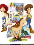 A large quantity of Pixar's Toy Story memorabilia, to include figurines, plush toys, stationery etc