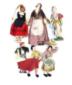 A selection of large early 20th century dolls in traditional dress from around the world, to