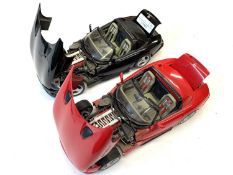 A pair of 1/18 die-cast vehicles of the Viper Dodge RT/10 by Burago.Featuring liftable bonnet and