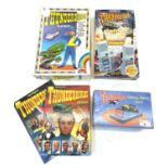 Mixed lot of Thunderbirds collectibles, to include: - A Grandstar Walkie Talkie set - A Dekker