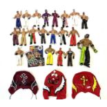 Mixed lot of WWE wrestling figures of Rey Mysterio in various costumes, and extras to include: - WWE