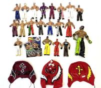 Mixed lot of WWE wrestling figures of Rey Mysterio in various costumes, and extras to include: - WWE