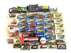 A large quantity of boxed and some loose die-cast and plastic toy vehicles. To include Tetley