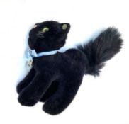 Modern Steiff black mohair cat with Steiff logo ear button. Approximately 5'' (front paw to ear tip)