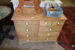 LATE 19TH/EARLY 20TH CENTURY NINE DRAWER PINE CHEST WITH TURNED HANDLES