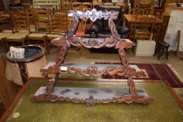 UNUSUAL FOUR TIER SHELF UNIT WITH CARVED DECORATION DATED 1919, 80 CM WIDE