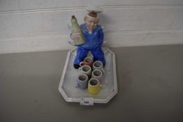 NOVELTY SPIRIT DECANTER AND CUPS FORMED AS A SAILOR
