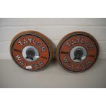 PAIR OF CIRCULAR METAL PLAQUES MARKED "TAYLOR WALKER SINCE 1730"