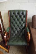 GREEN LEATHER UPHOLSTERED ROCKING CHAIR