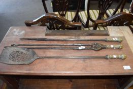 SET OF THREE ANTIQUE STEEL AND BRASS MOUNTED FIRE TOOLS