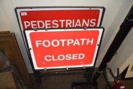 TWO METAL FRAMED SIGNS "FOOTPATH CLOSED" AND "PEDESTRIANS"