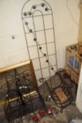 MIXED LOT: VARIOUS IRON WARES COMPRISING LOG BASKET, CANDLE STAND, HANGING RACK AND PLANT TRAINER