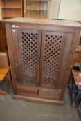 MODERN STAINED PINE TELEVISION CABINET WITH MESH DOORS
