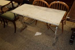 CAST BASED GARDEN TABLE WITH WHITE MARBLE TOP, 1115 CM WIDE, THE MARBLE IS LIKELY REPLACEMENT FROM A