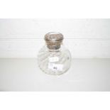 A SILVER TOPPED CLEAR GLASS DRESSING TABLE JAR