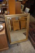 RECTANGULAR BEVELLED WALL MIRROR IN GILT FINISHED FRAME, 106 CM HIGH