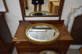 OVAL BEVELLED WALL MIRROR IN GILT EFFECT FRAME, 60 CM WIDE