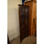 20TH CENTURY OAK FLOOR STANDING FOUR DOOR CORNER CABINET