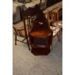 LATE VICTORIAN AMERICAN WALNUT CORNER DISPLAY CABINET WITH CENTRAL CARVED DOOR