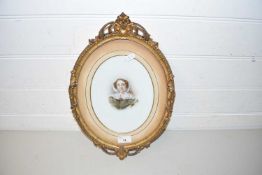 VICTORIAN HEAD AND SHOULDERS PORTRAIT OF A LADY ON MILK GLASS BACKING SET IN AN OVAL GILT FRAM