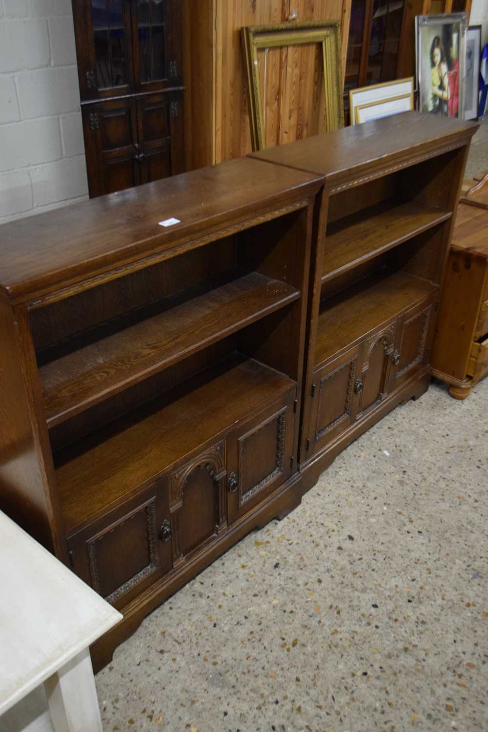 PAIR OF 20TH CENTURY OAK BOOKCASE CABINETS WITH CUPBOARD BASES, 84 CM WIDE