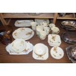 COLLECTION OF PARROT DECORATED TEA AND TABLE WARES