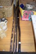 FOUR VARIOUS ASSORTED WALKING STICKS