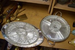 TWO SILVER PLATE MOUNTED AND CLEAR GLASS HORS D'OEUVRES DISHES