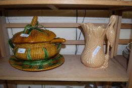 MAJOLICA STYLE SOUP TERRINE AND STAND TOGETHER WITH A SYLVAC HERON HANDLED JUG