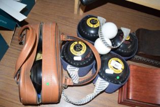 TWO CASES OF LAWN BOWLS