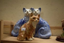WINSTANLEY MODEL CAT PLUS FURTHER PAIR OF BLUE GLAZED ARTHUR WOOD CATS (3)