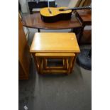 NEST OF MODERN STAINED PINE TABLES