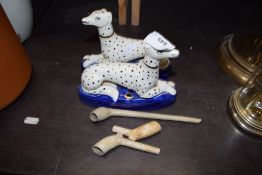 STAFFORDSHIRE STYLE MODEL OF A GREYHOUND TOGETHER WITH FURTHER PAIR OF STAFFORDSHIRE STYLE DOG