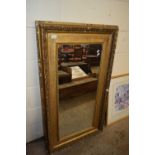 19TH CENTURY GILT PICTURE FRAME CONTAINING A MIRROR, 70 CM X 123 CM