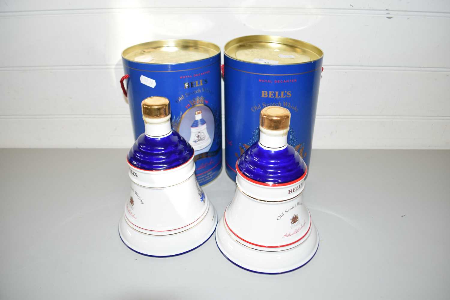BELLS OLD SCOTCH WHISKEY WEIGHED DECANTERS COMMEMORATING THE BIRTH OF PRINCESS BEATRICE AND PRINCESS