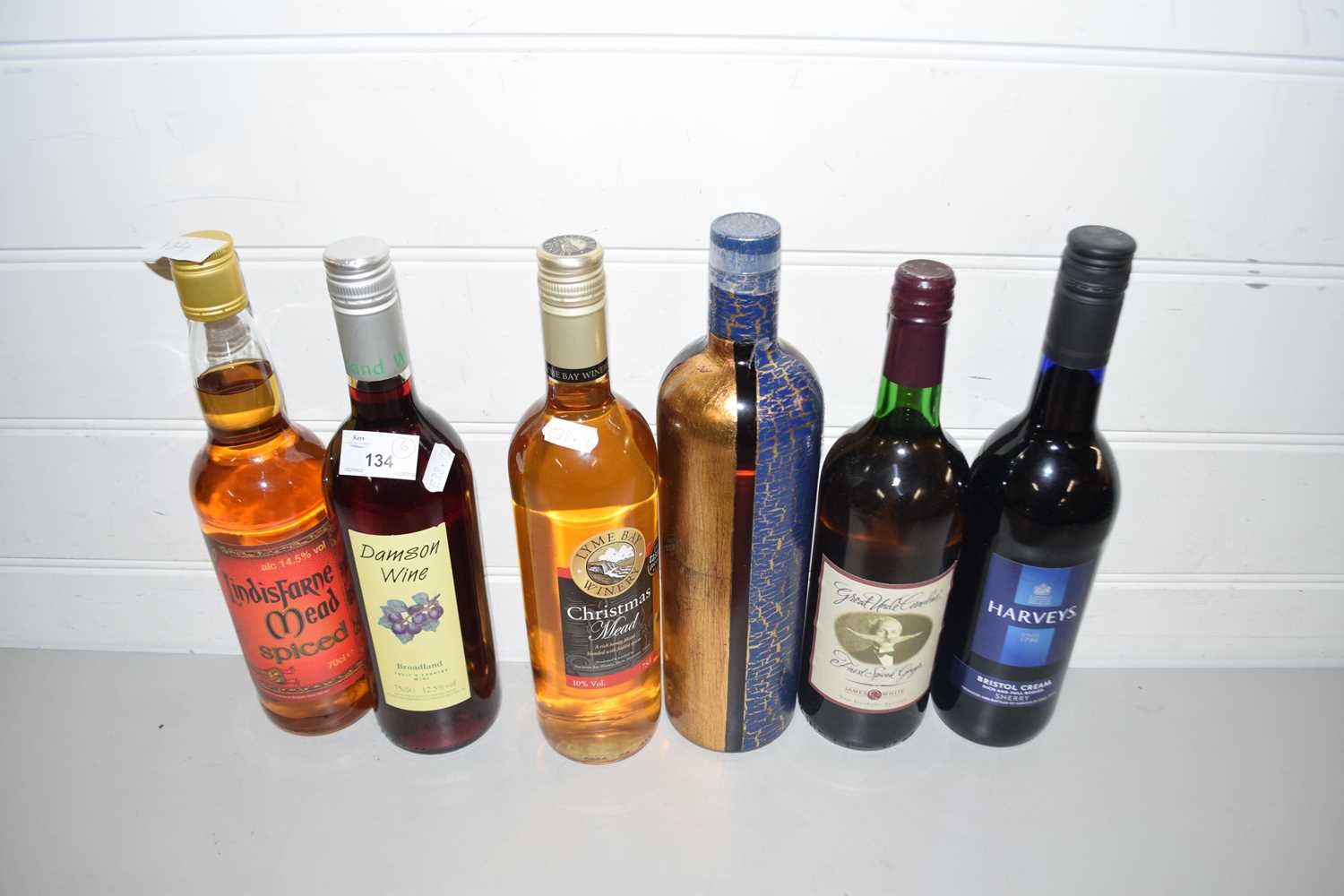SIX BOTTLES OF WINE AND OTHERS TO INCLUDE CHRISTMAS MEAD, MEAD, DAMSON WINE AND OTHERS (6)