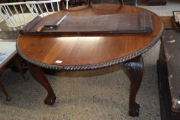 EDWARDIAN MAHOGANY OVAL DINING TABLE RAISED ON BALL AND CLAW FEET WITH EXTRA EXTENSION LEAF AND